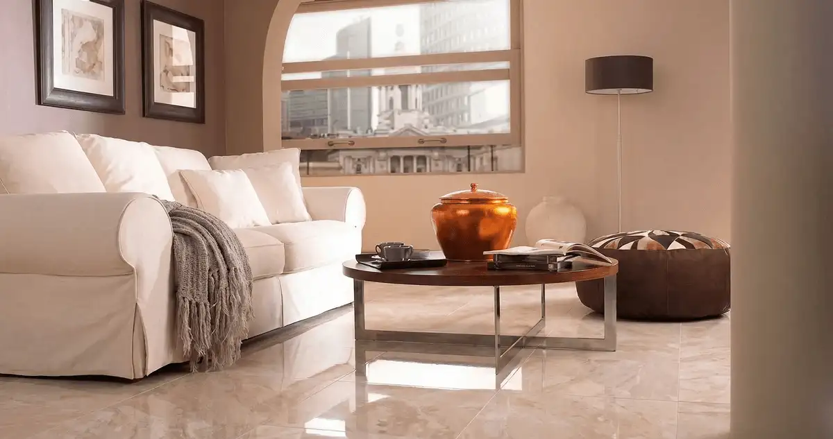 Modern living room with professionally installed marble flooring, a beige sofa, coffee table in Lincoln, NE