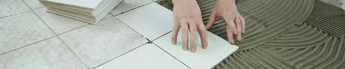 Professional installing white tile floors in Lincoln, NE